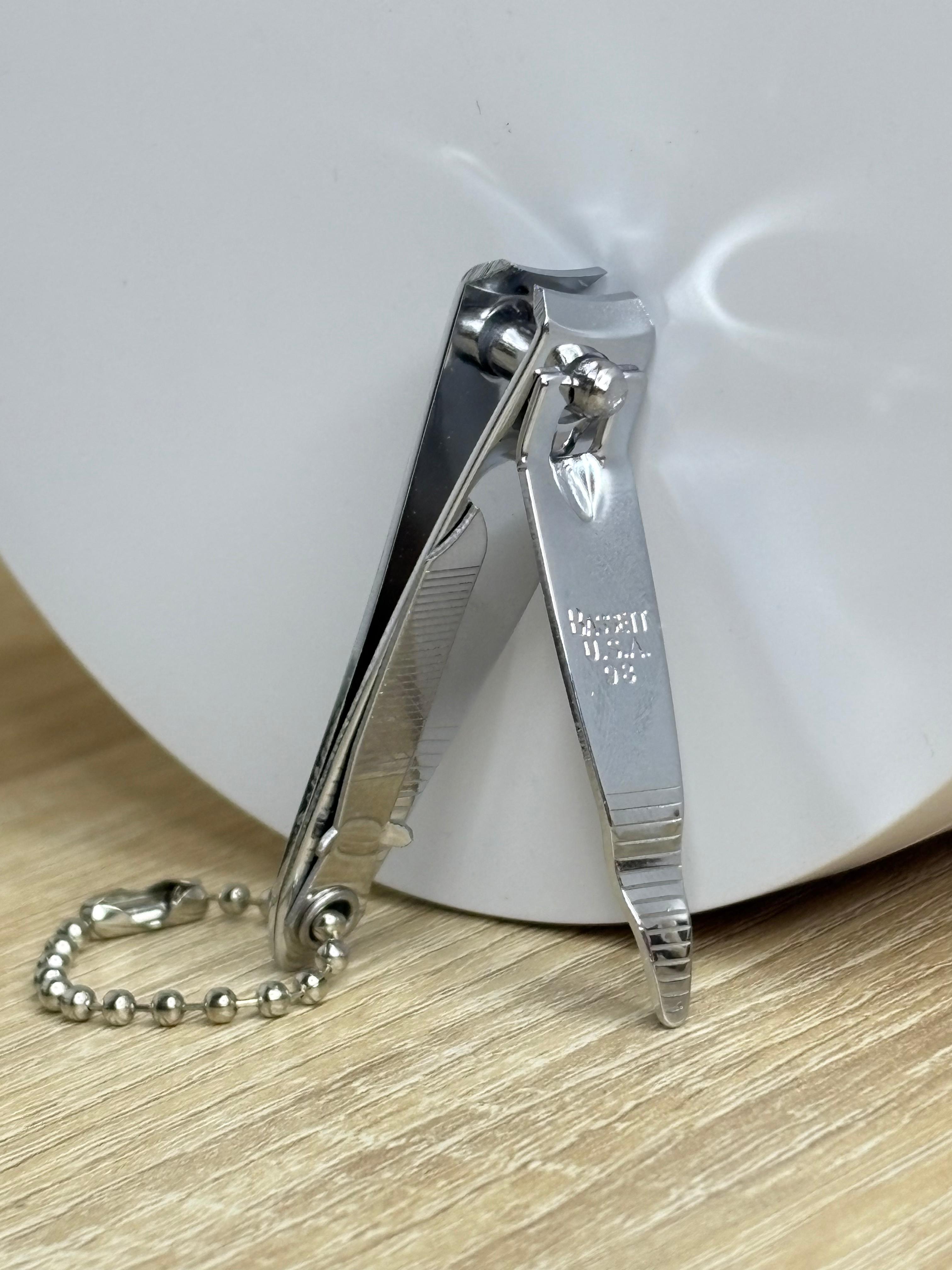 CORTA UÑAS CASERO 602